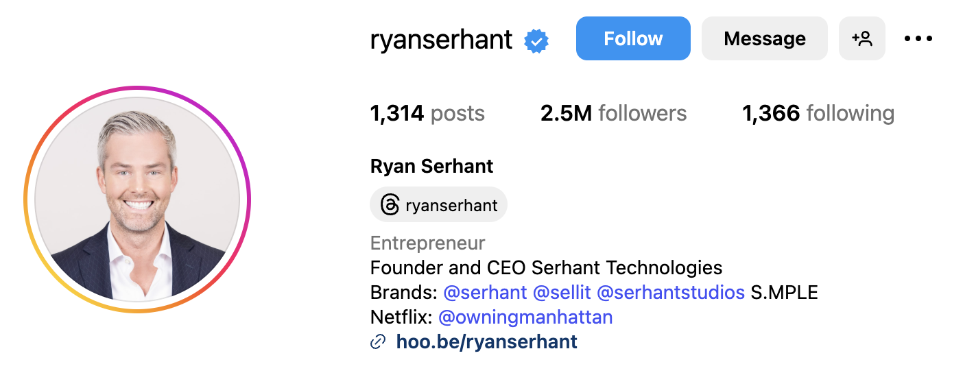 Ryan Serhant, luxury real estate influencer, wearing a tailored suit